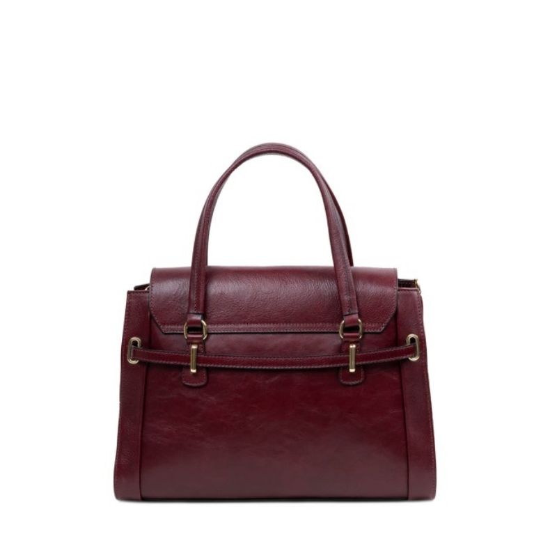 Side view of Numabagstore's Emanuela Warm Brown, a luxury leather handbag for women