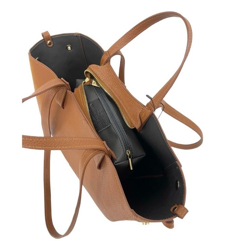 Numabagstore's Stefania Camel leather purse worn as a crossbody bag